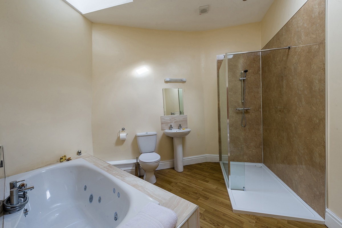 Spacious bathroom in the self-contained holiday accommodation in Cumbria